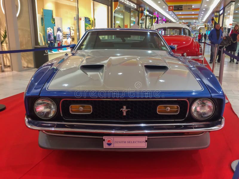 Ford Mustang Specs 1971 blue. Exhibition of vintage cars in Carrefour shopping center in Talavera de la Reina, January 25, 2019. Ford Mustang Specs 1971 blue. Exhibition of vintage cars in Carrefour shopping center in Talavera de la Reina, January 25, 2019